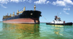 Tugboat-and-ship-inside-the-harbor