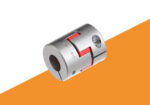 New ComInTec jaw coupling with red spider. Background is half white, half orange.